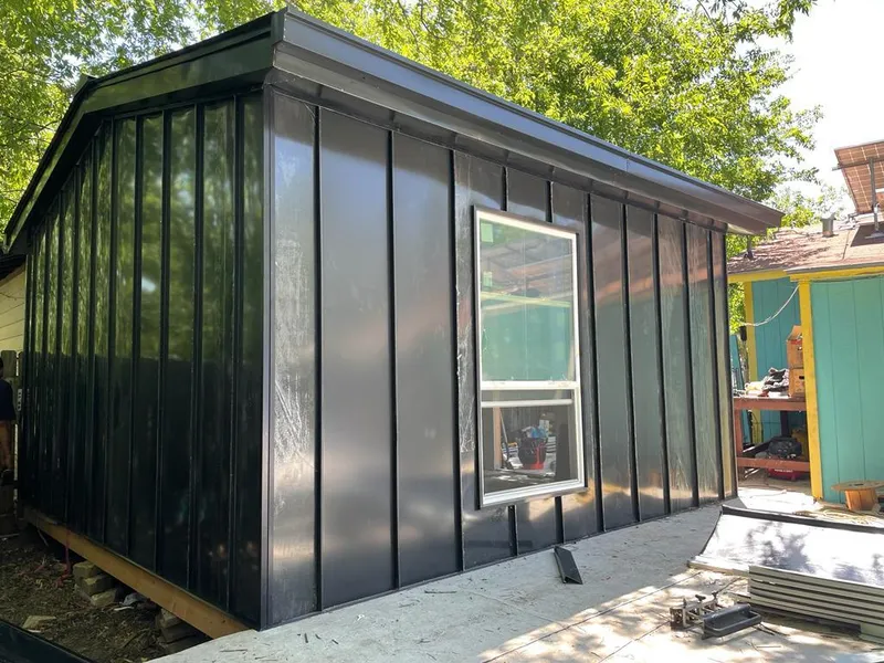 Black standing seam metal wall panels for Metal Roof Installation in Van Alstyne