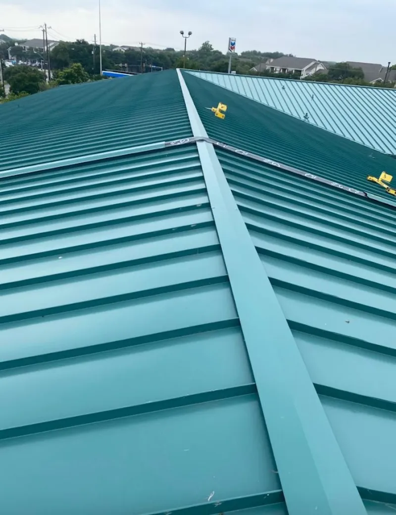 Green commercial metal roof ridge and valley for Metal Roof Repair in Van Alstyne