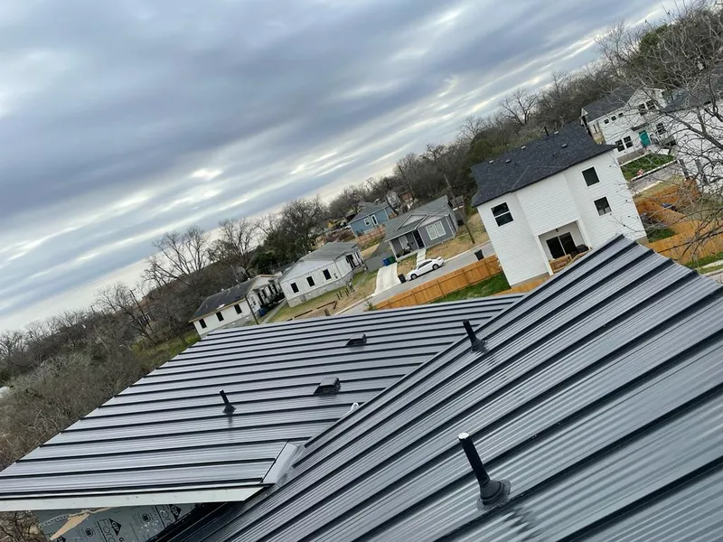 Standing seam metal roof panels with vents for Skylight Repair in Van Alstyne